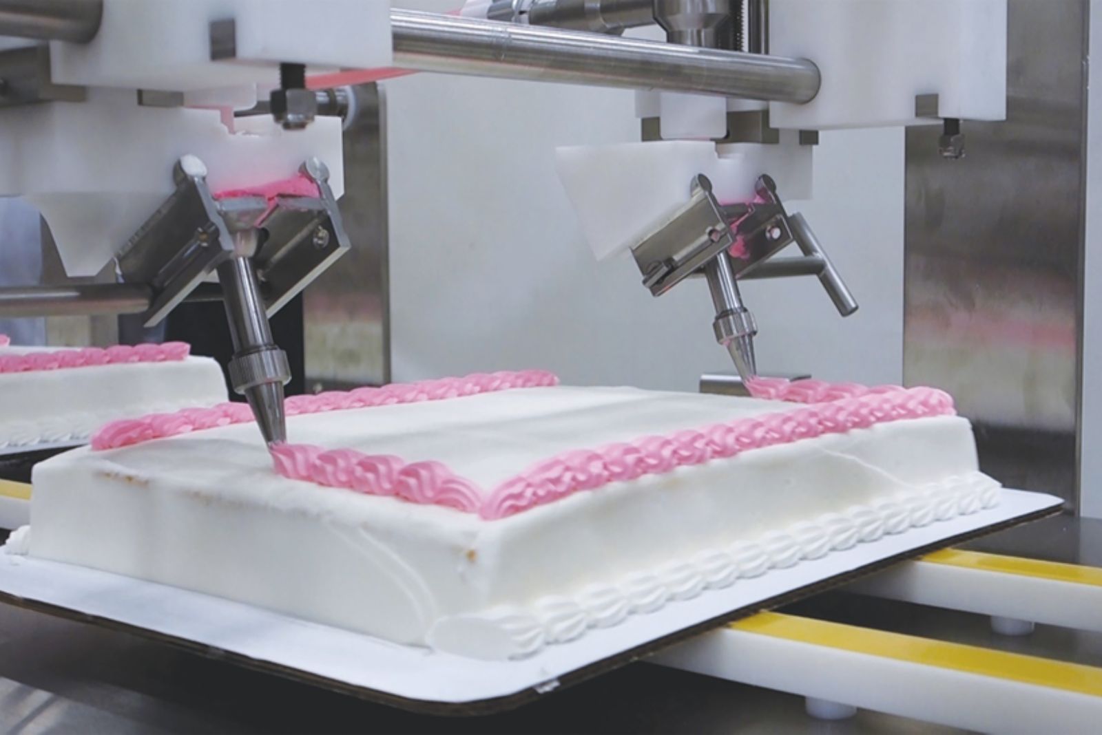 Unifiller debuts automatic icing sheet cake computer Commercial Baking