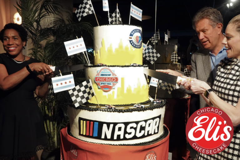 500 pound cheesecake with NASCAR logo and eli's cheesecake logo