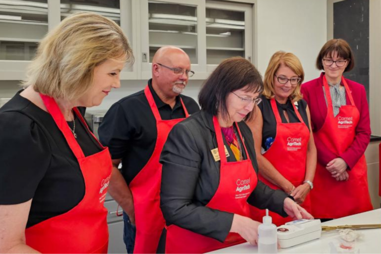 people celebrating the grand opening of Cornell AgriTech's Food Innovation Lab