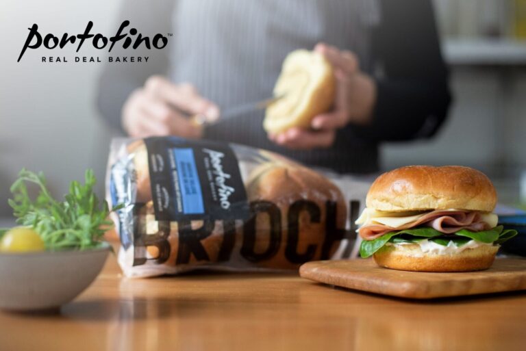 Portofino Bakery Brioche Buns on counter next to sandwich