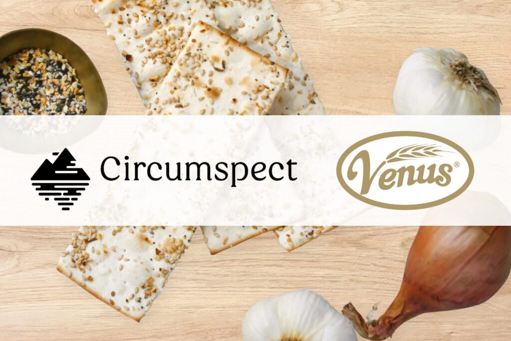 Circumspect and Venus brand logos on top of cracker and seasoning photo