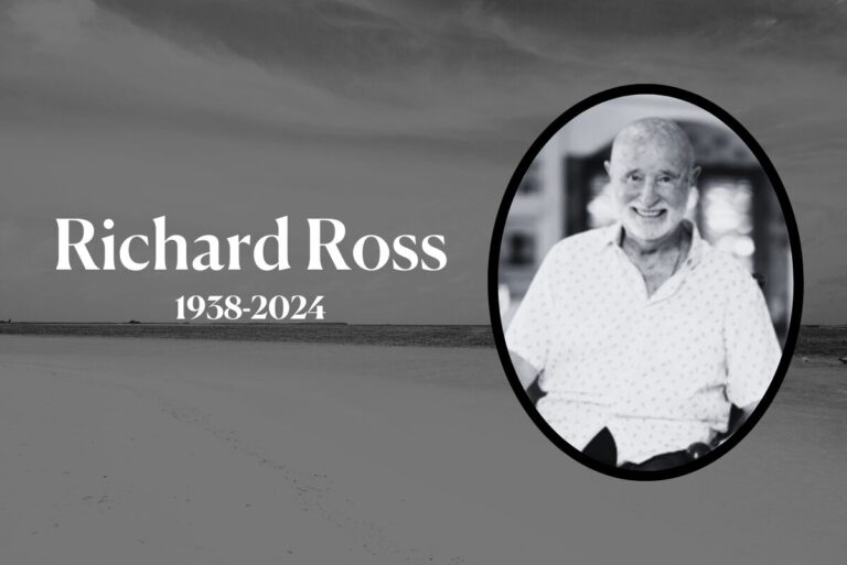 Framed photo of Richard Ross on a black and white background of the sea.