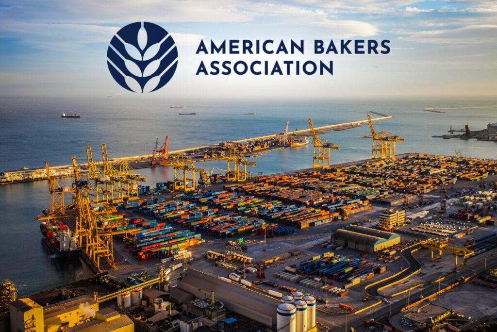 shipping containers on a port with the american bakers association logo