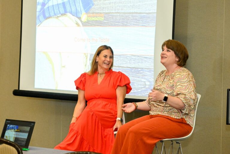 Joanie Spencer and Erin Ball smiling during a Nexus 2024 education session about the Grain Foods Foundation