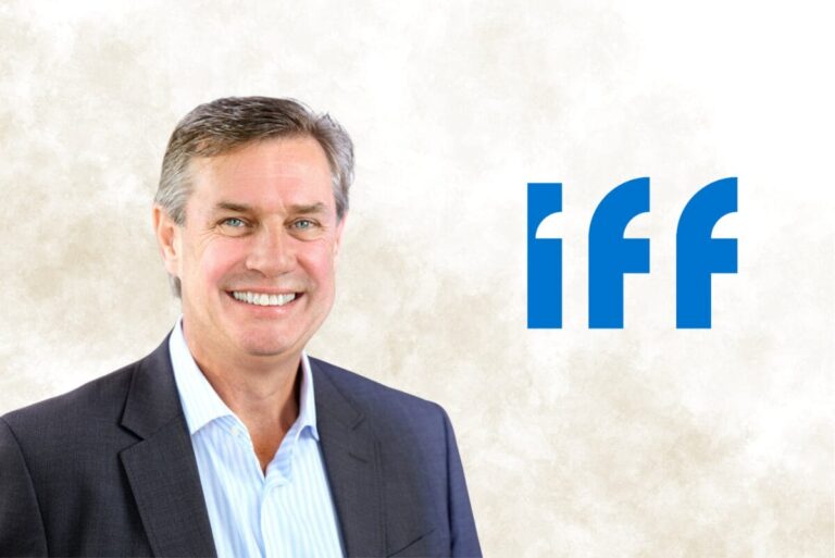 Andy Muller next to blue IFF logo