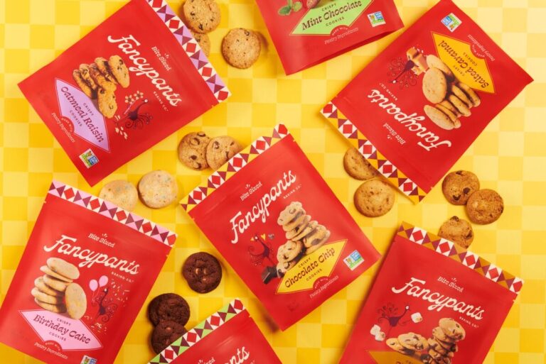 Packs of Fancypants cookies on yellow backdrop