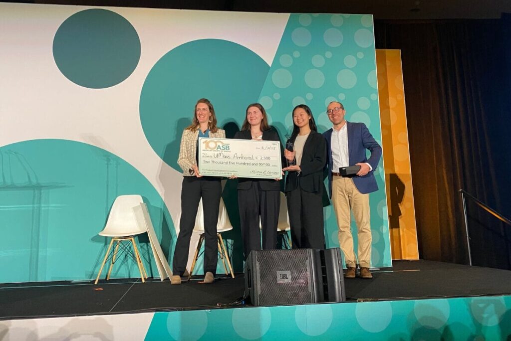 Madeline Murphy and Nicholle Tan receiving the grand prize for the 2025 Product Development Competition