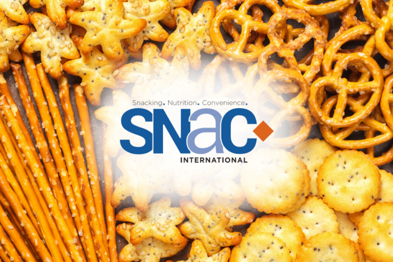 SNAC International logo over laid out snacks
