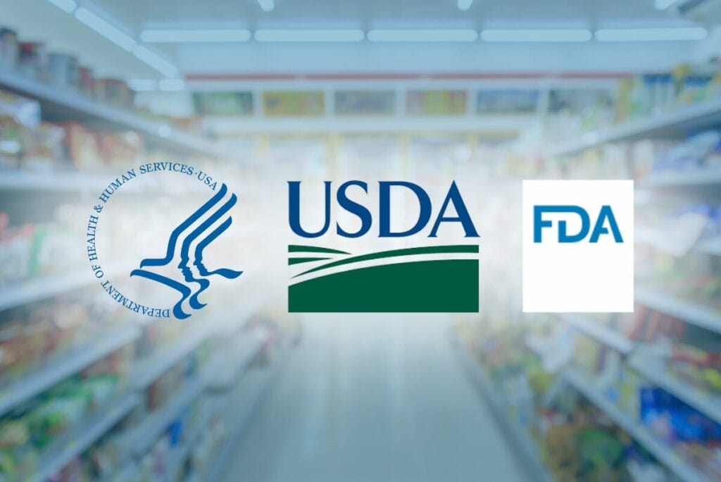 HHS, USDA and FDA logos over blue-tinted blurred grocery aisle