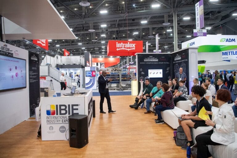 Speaker presenting on show floor during IBIE 2022 in Artisan Marketplace