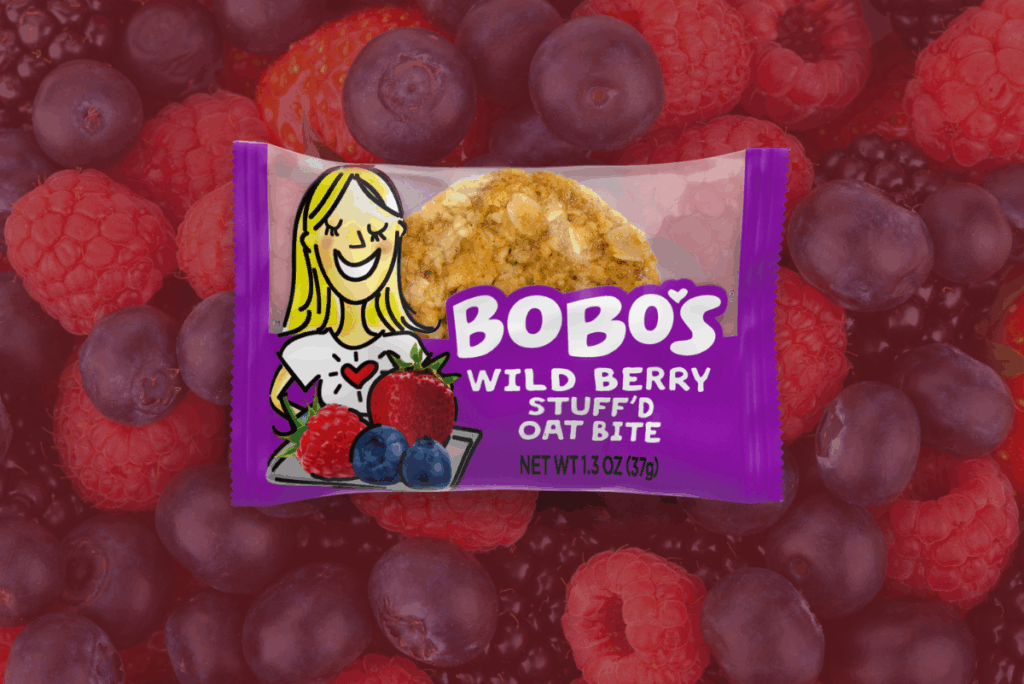 Bobo's Wild Berry Stuff'd Oat Bites package with mixed berry background
