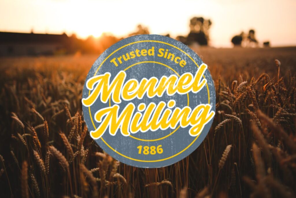 Mennel Milling Co. logo over wheat field