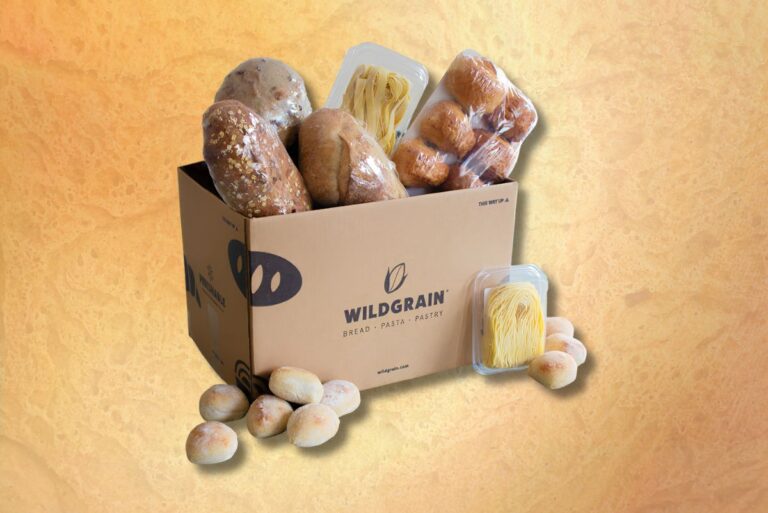 Wildgrain's subscription box on a gradient background