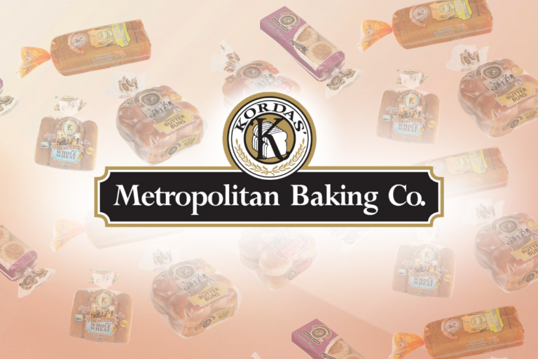 Metropolitan Baking Company logo with various breads, buns and rolls in the background