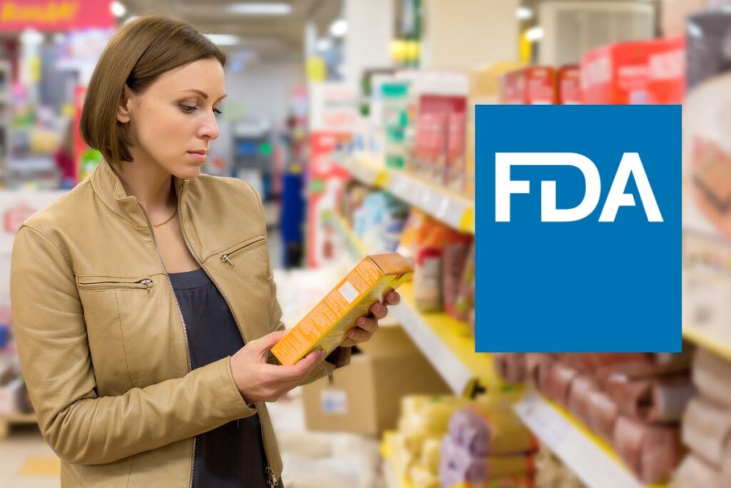 person looking at label on packaged food