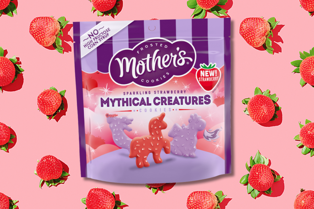 Mother's Sparkling Strawberry Mythical Creatures cookie over strawberry background