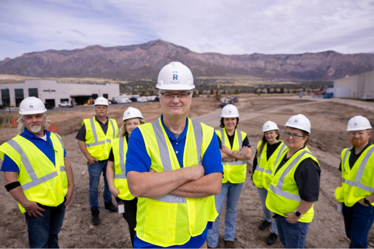 Rise Baking team members wearing hard hats and safety vests at Pleasant View, UT, facility