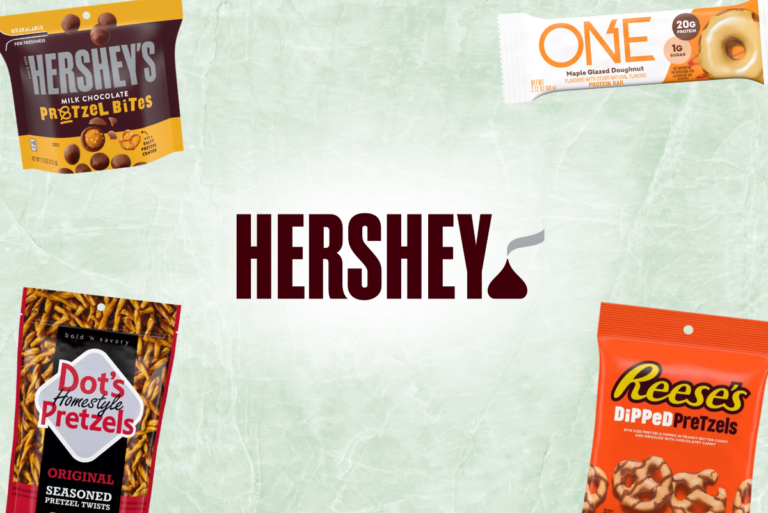 Hershey logo and assorted sweet and salty products from the brand on light green background