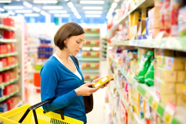 Skeptical consumer reading tailored messaging and product label