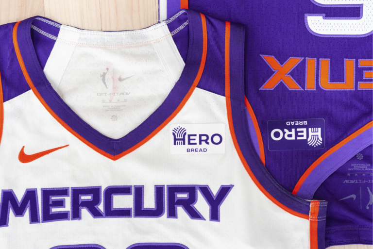 White and purple Phoenix Mercury jerseys with Hero Bread badges