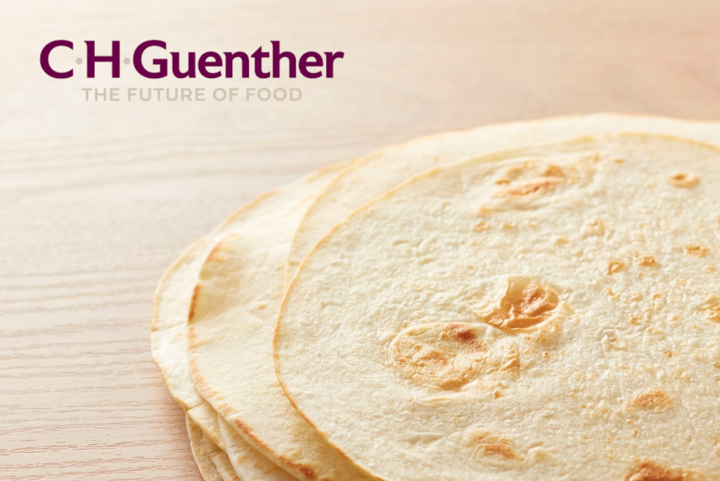C.H. Guenther logo and image of tortillas on light wood background