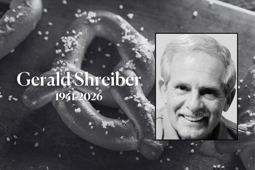 Gerald Shreiber headshot with pretzel background