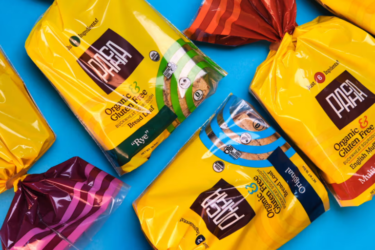 Assorted packages of PACHA breads on blue background