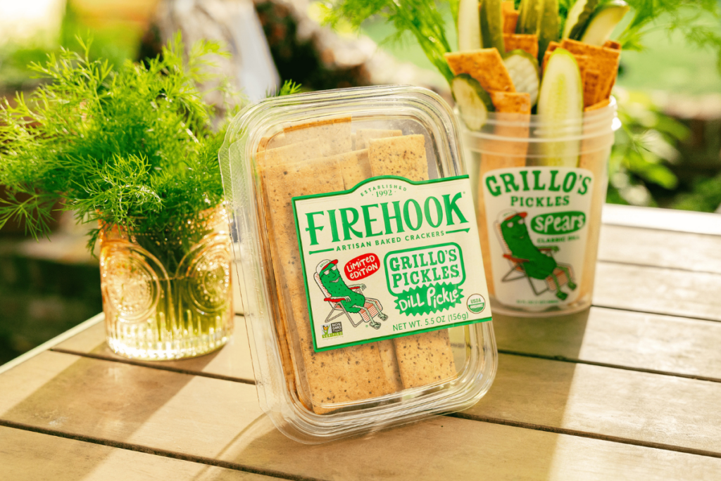 Box of Firehook x Grillo's Dill Pickle Crackers on white wooden table