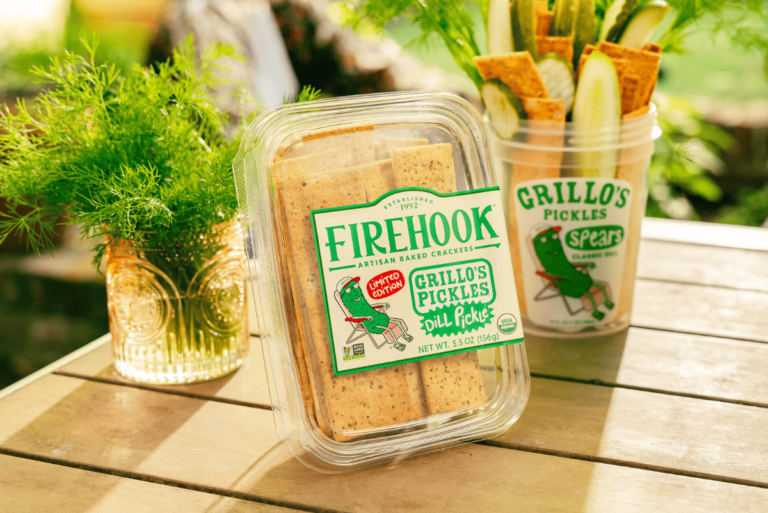 Box of Firehook x Grillo's Dill Pickle Crackers on white wooden table